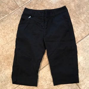 Black capri walking pants.
